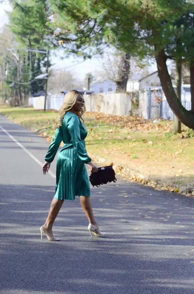 beautiful black woman beauty influencer in green dress