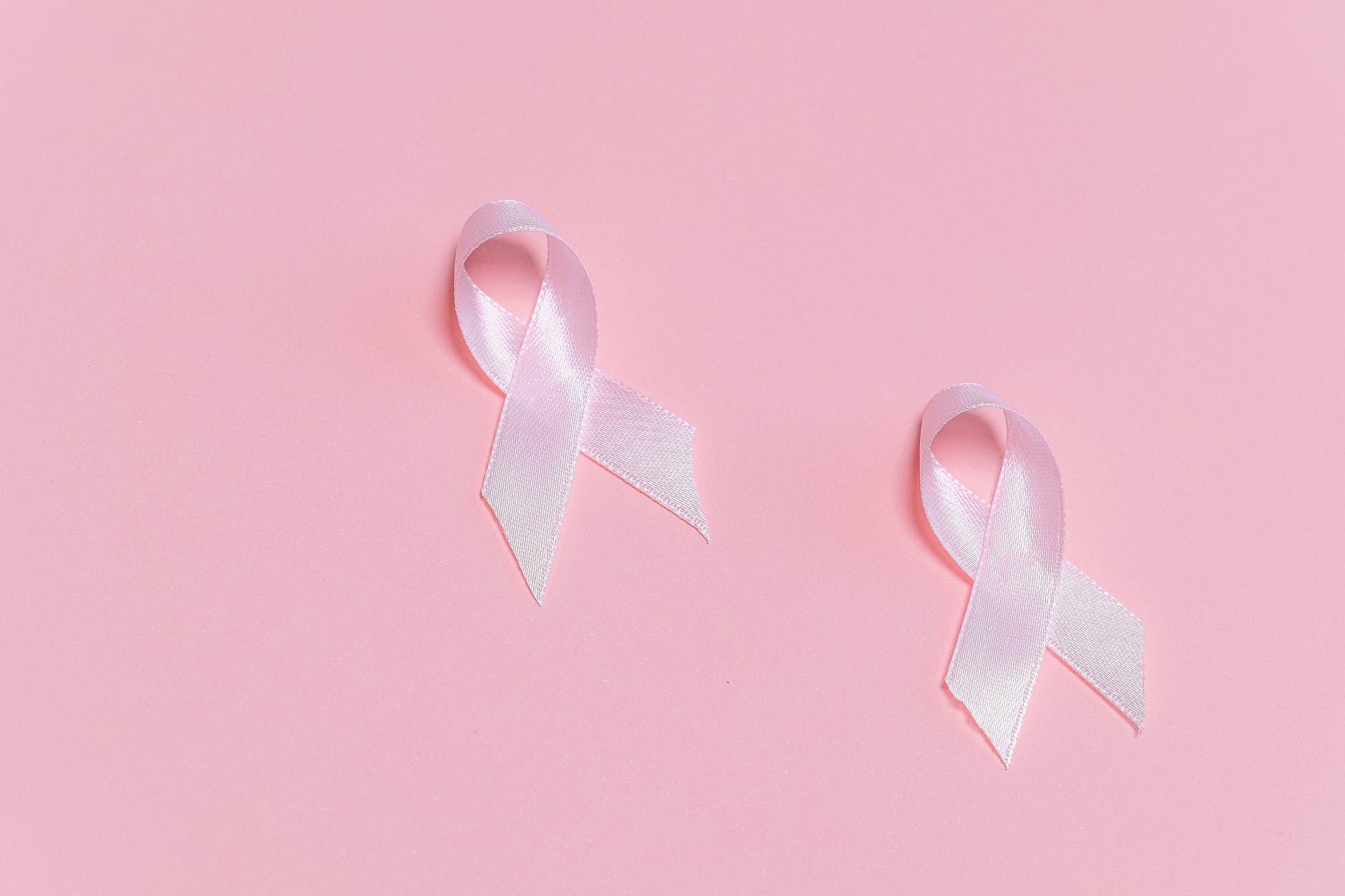 pink ribbons on pink surface