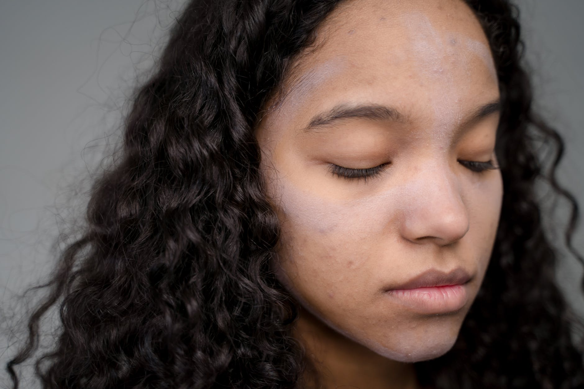 woman with black curly hair